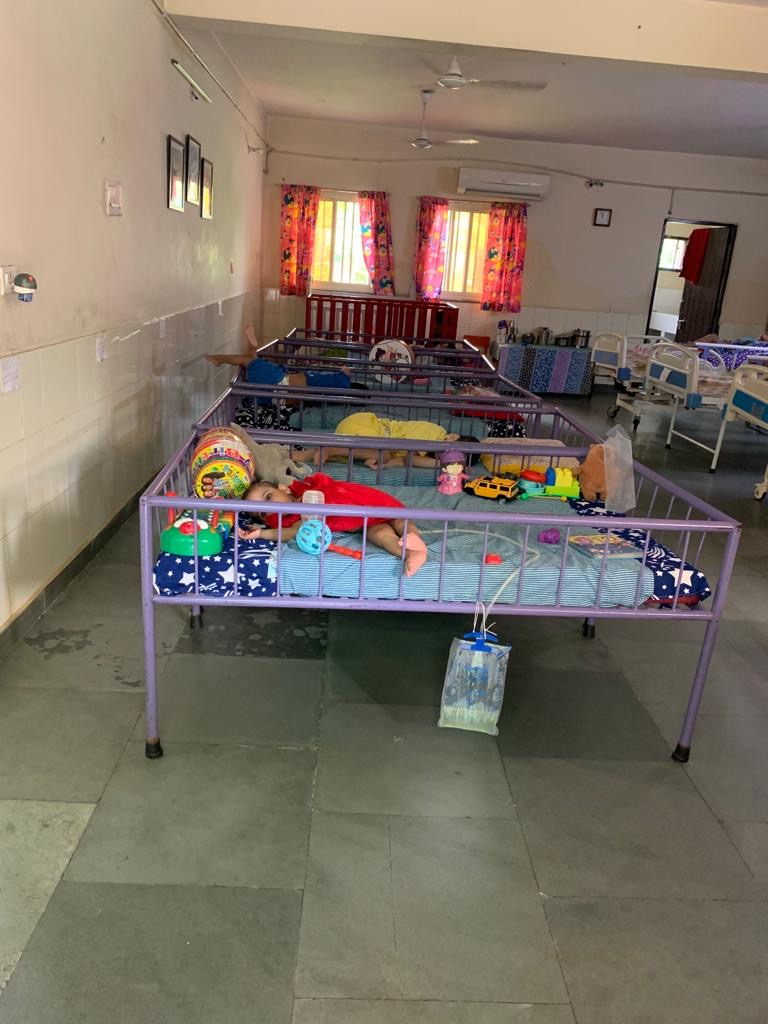 Palna care room with beds and children's toys